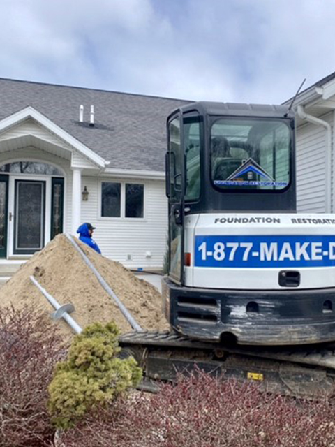 More foundation repair with heavy equipment