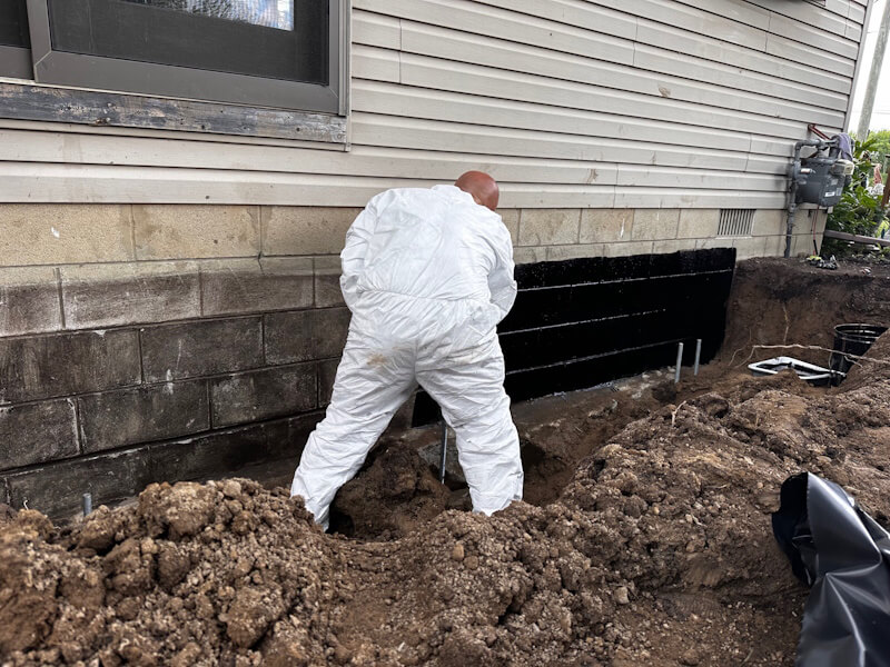 Rockwood Michigan Foundation Repair - Adding Tar Sealant